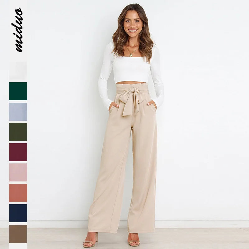 Damskie spodnie garniturowe z paskiem